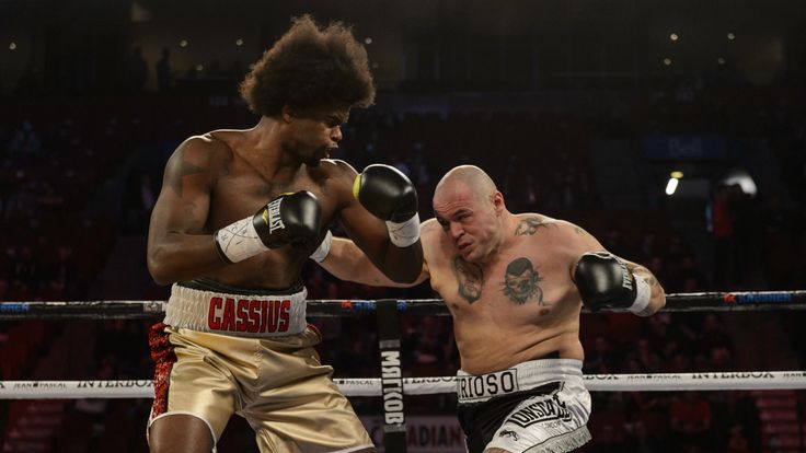 MONTREAL, QC - JANUARY 30:  Cassius Chaney of the US blocks a punch by Zoltan Csala of Hungary during the super welterweight match at the Bell Centre on Ja