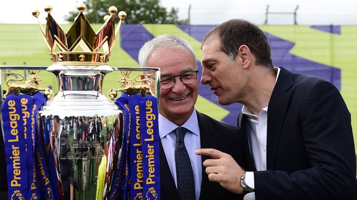 ISLINGTON, ENGLAND - AUGUST 10:  Claudio Ranieri, manager of Leicester City and Slaven Bilic, manager of West Ham United share a joke during the Official P