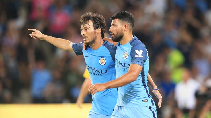 Manchester City's David Silva and Sergio Aguero celebrating the goal v Borussia Dortmund