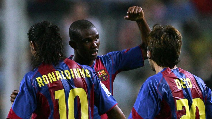 FC Barcelona's Eto'o of Cameroon (c) Brazilian's Ronaldinho (L) and Portuguese Deco (R) celebrate their first goal against Real Zaragoza in 2004