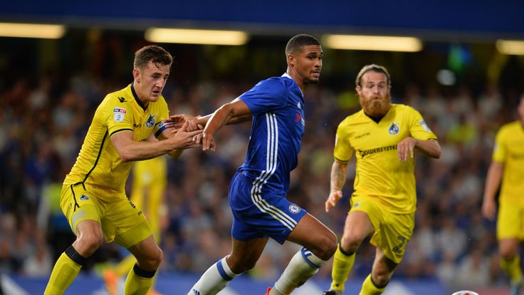 Chelsea's midfielder Ruben Loftus-Cheek runs with the ball challenged by Bristol Rovers players in the EFL Cup tie at Stamford Bridge in August 2016