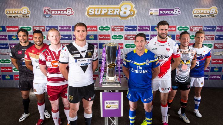 Hep Cahill, Jodie Broughton, Liam Farrell, Scott Taylor, Kurt Gidley, Alex Walmsley, Luke Dorn and Jacob Miller pose with the Super League trophy