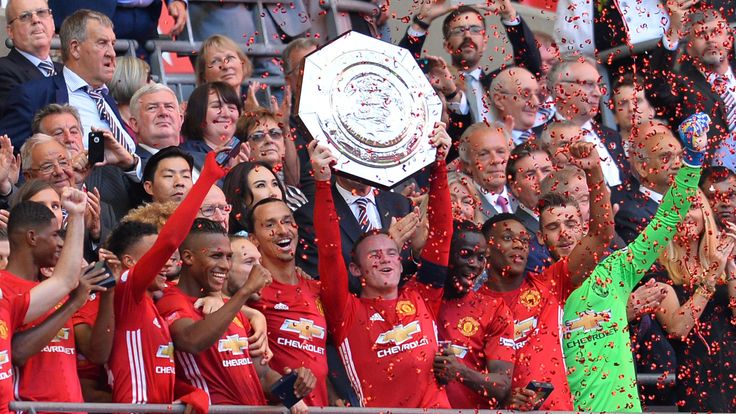 Wayne Rooney lifts the Community Shield at Wembley