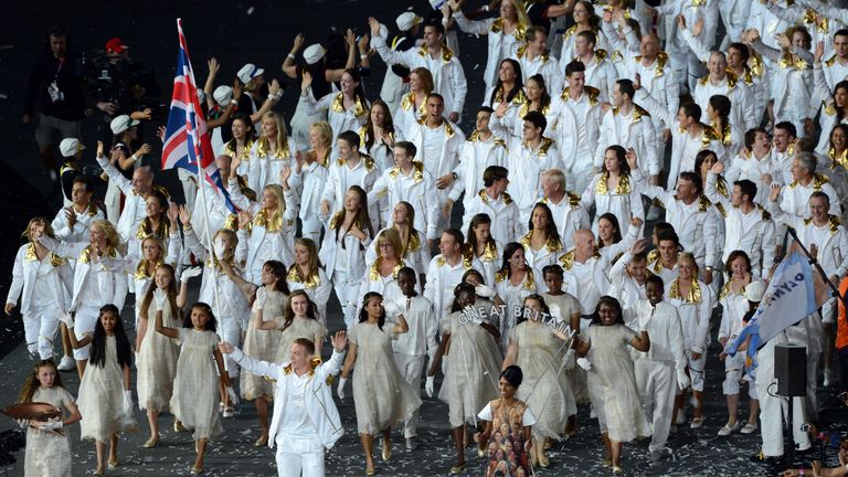  Sir Chris Hoy carries the flag of Great Britain during the Opening Ceremony of the London 2012 Olympic Games at the Olympic Stadium