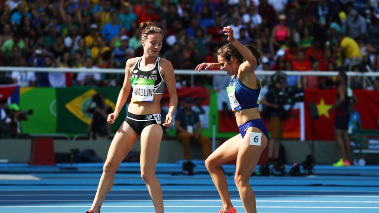 RIO DE JANEIRO, BRAZIL - AUGUST 16:  Abbey D'Agostino of the United States (R) and Nikki Hamblin of New Zealand react after a collision during the Women's 