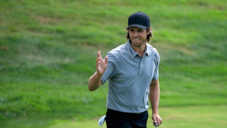 CROMWELL, CT - AUGUST 5: Aaron Baddeley of Australia reacts on the 18th green during the second round of the Travelers Championship at the TPC River Highla