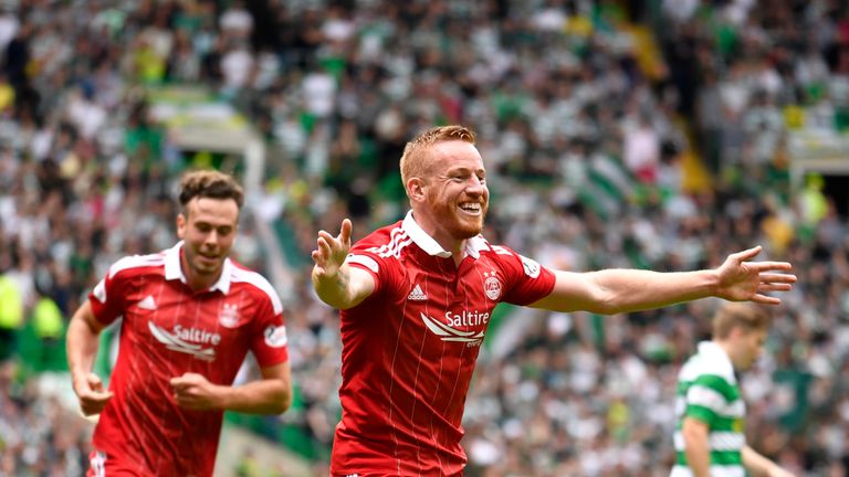Aberdeen's Adam Rooney celebrates his equaliser against Celtic