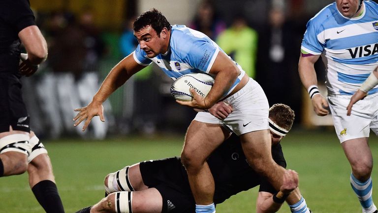 Agustin Creevy (C) of Argentina is tackled by Brodie Retallick of the New Zealand All Blacks during the Rugby Championship Test match between New Zealand a