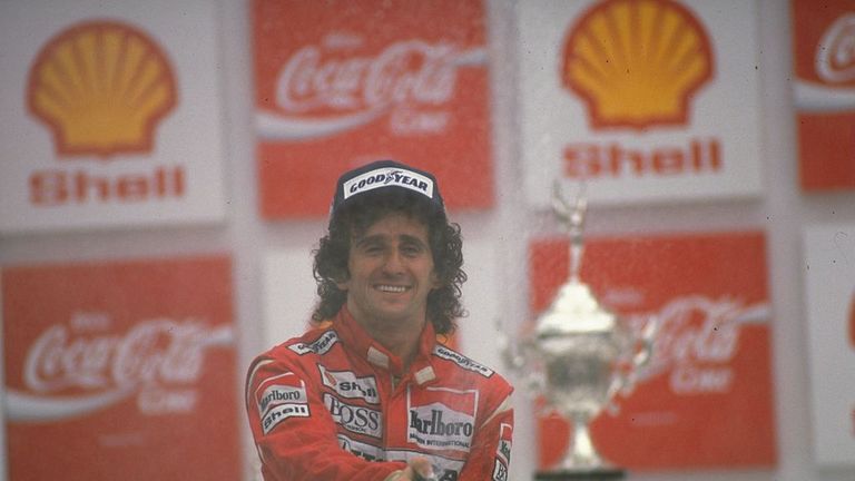 1988:  McLaren Honda driver Alain Prost of France partakes in the traditional champagne celebration after his victory in the Brazilian Grand Prix at the Ri