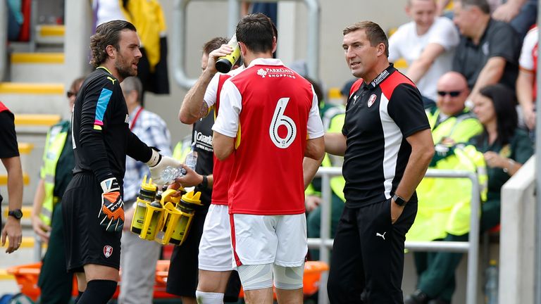 Alan Stubbs (right) has paid a club record fee to bring Taylor to Rotherham from Peterborough