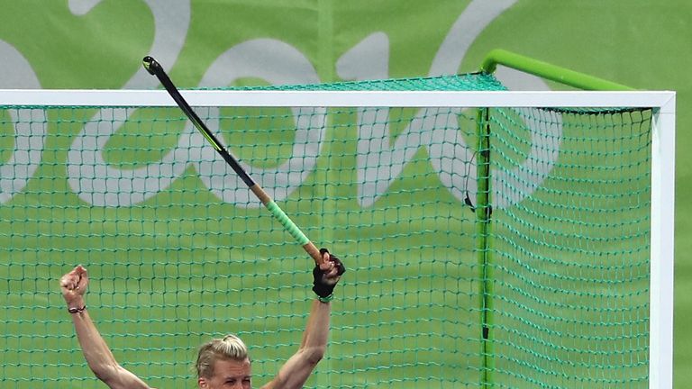 RIO DE JANEIRO, BRAZIL - AUGUST 13:  Alex Danson of Great Britain celebrates after scoring their second goal during the Women's group B hockey match betwee