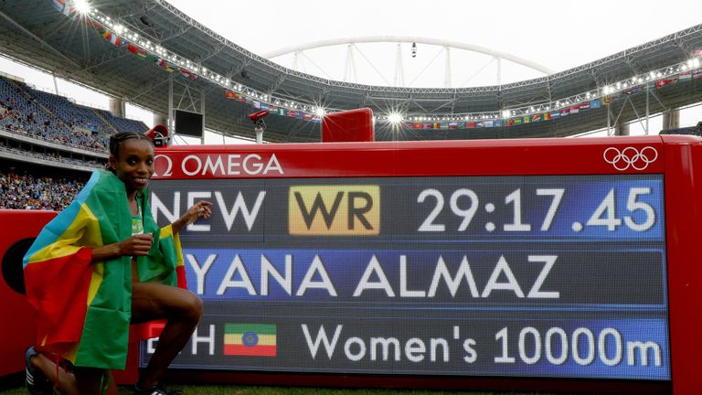 RIO DE JANEIRO, BRAZIL - AUGUST 12:  Almaz Ayana of Ethiopia celebrates winning the Women's 10,000 Meters Final and setting a new world record of 29:17.45 