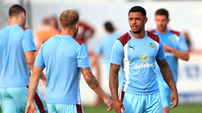 Burnley's Andre Gray (right) warms up before the EFL Cup Second Round match