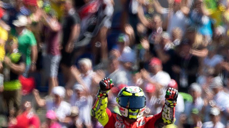 Italian rider Andrea Iannone of Ducati celebrates his victory in the Austrian Grand Prix