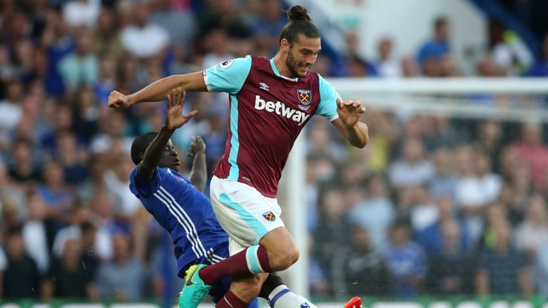 West Ham  striker Andy Carroll is fouled by Chelsea's N'Golo Kante