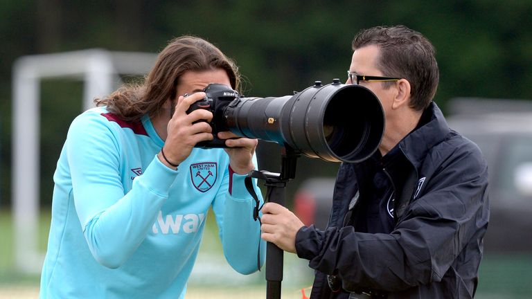 West  Ham striker Andy Carroll turns cameraman at training
