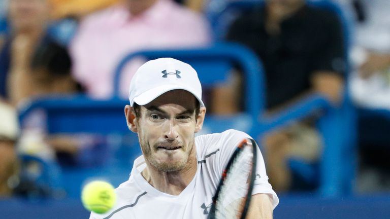 MASON, OH - AUGUST 18: Andy Murray of Great Britain hits a return to Kevin Anderson of South Africa during a third round match on Day 6 of the Western & So