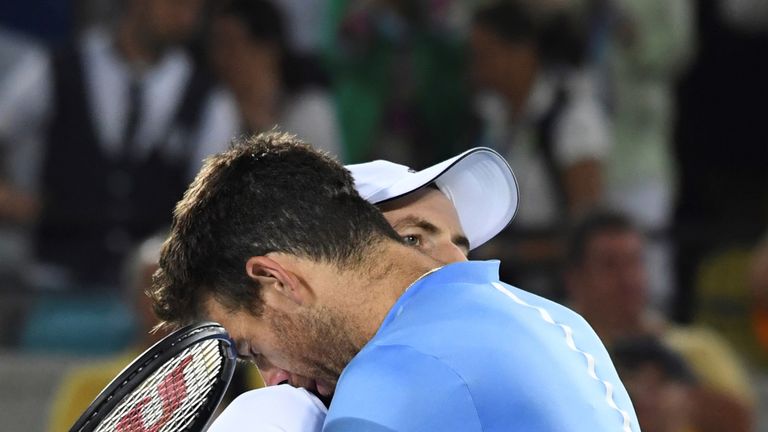 Argentina's Juan Martin Del Potro congratulates Britain's Andy Murray on winning the men's singles gold medal tennis match at the Olympic Tennis Centre of 