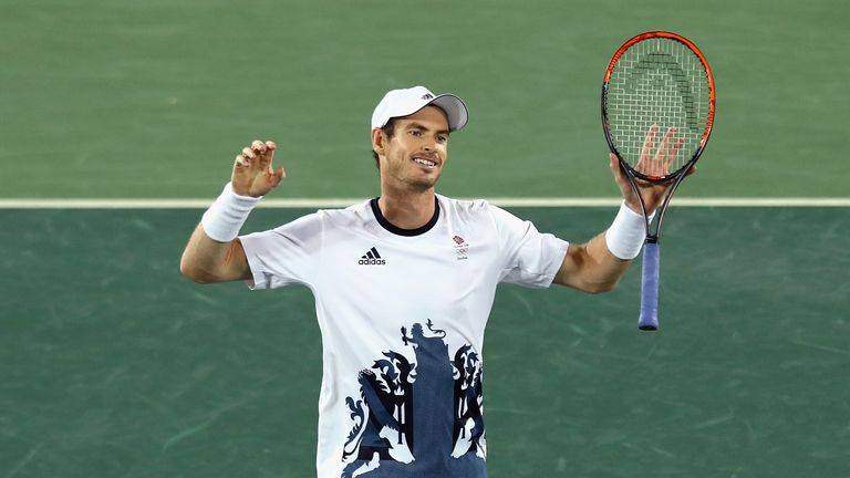 Andy Murray of Great Britain celebrates after defeating Juan Martin Del Potro 