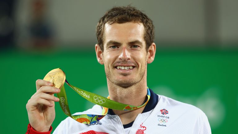 RIO DE JANEIRO, BRAZIL - AUGUST 14:  Gold medalist Andy Murray of Great Britain poses on the podium during the medal ceremony for the men's singles on Day 