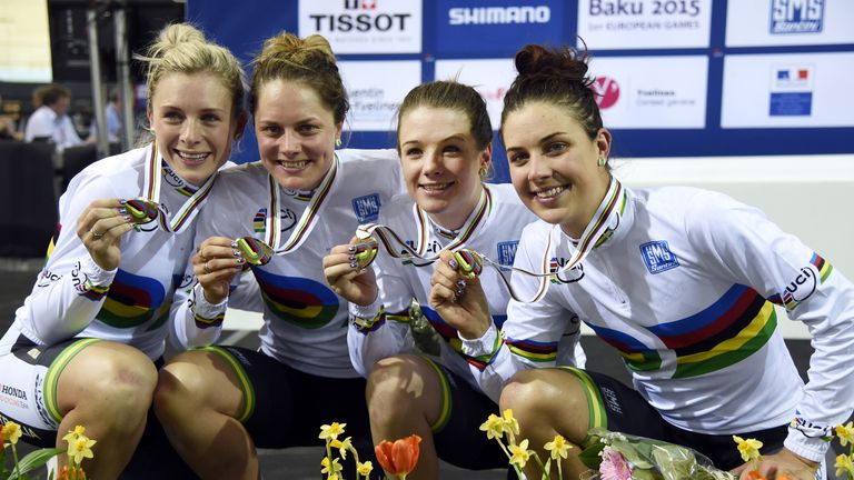 Members of the Australia's team, (from L) Annette Edmondson, Ashlee Ankudinoff, Amy Cure and Melissa Hoskins celebrate on the podium after winning the Wome