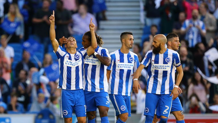 Brighton and Hove Albion's Anthony Knockaert (left) celebrates scoring his sides first goal of the game during the Sky Bet Championship match at the AMEX S