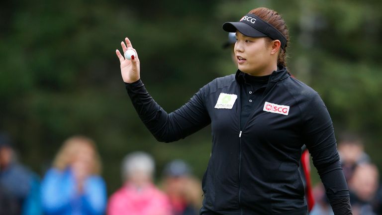CALGARY, AB - AUGUST 28: Ariya Jutanugarn of Thailand waves after making her putt on the first hole during the final round of the Canadian Pacific Women's 