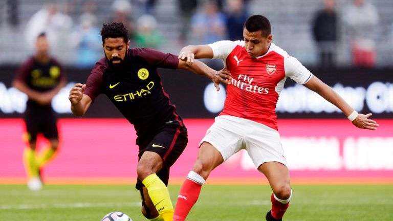 GOTHENBURG, SWEDEN - AUGUST 07: Gael Clichy of Manchester City and Alexis Sanchez of Arsenal competes for the ball during the Pre-Season Friendly between A