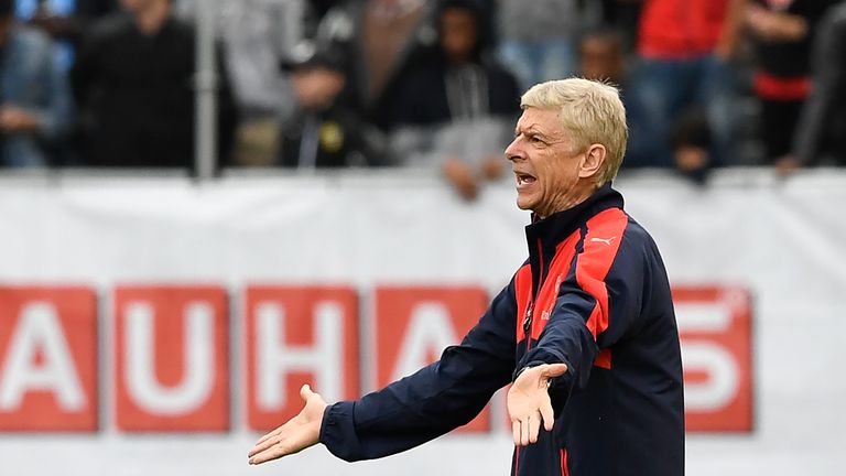 Arsenal's French head coach Arsene Wenger reacts during the friendly football match between Arsenal and Manchester City at the Ullevi stadium in Gothenburg