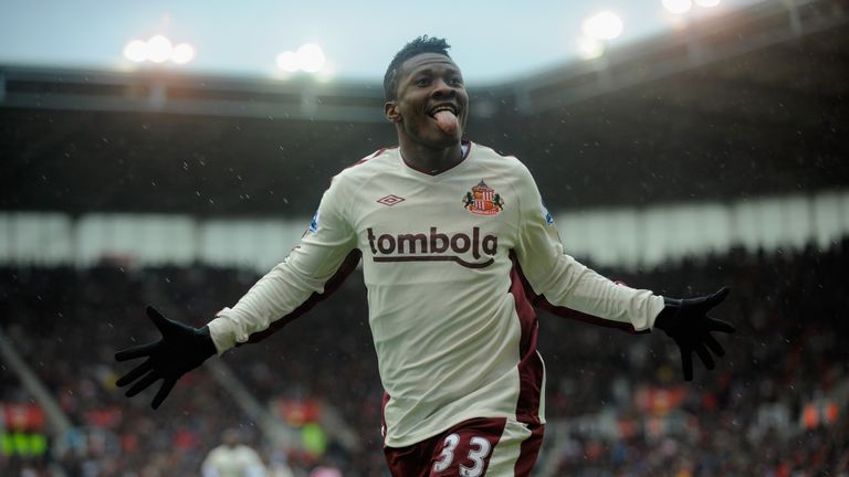 STOKE ON TRENT, ENGLAND - FEBRUARY 05:  Asamoah Gyan of Sunderland celebrates scoring to make it 2-1 during the Barclays Premier League match between Stoke
