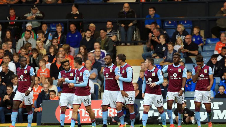 Aston Villa's Jordan Ayew (centre left) celebrates scoring his side's first goal of the game with team-mates during the EFL Cup, First Round match at Luton