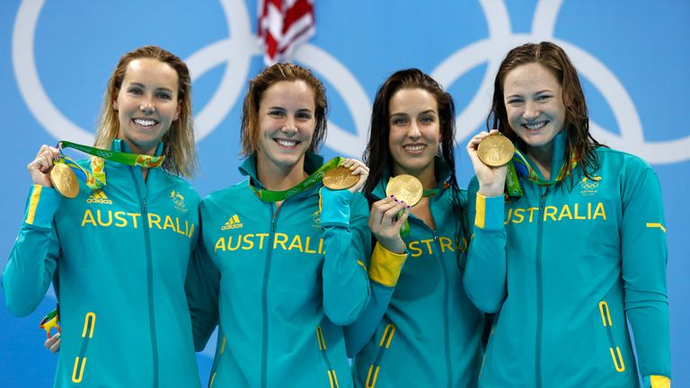 Emma McKeon, Brittany Elmslie, Bronte Campbell and Cate Campbell of Australia set a new world record in the 4 x 100m relay
