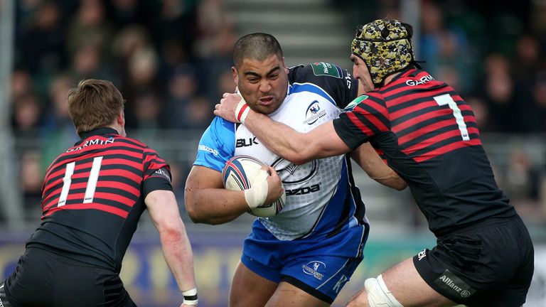 BARNET, ENGLAND - JANUARY 18: Rodney Ah You of Connacht is tackled by Kelly Brown and David Strettle of Saracens during the Heineken Cup round six match be