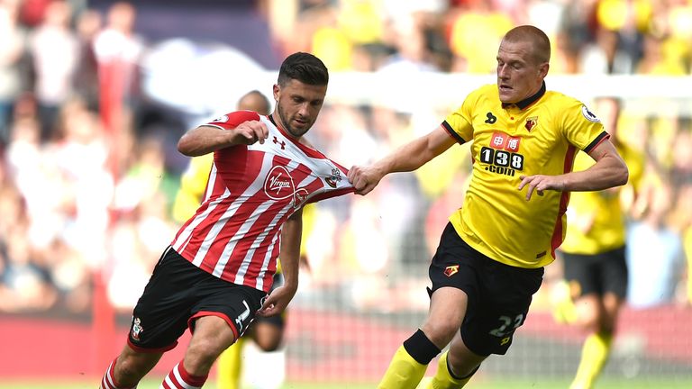 Ben Watson [right] was sent off for pulling Shane Long [left] to the ground