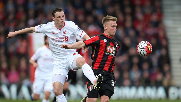 BOURNEMOUTH, ENGLAND - APRIL 17:  Brad Smith of Liverpool and Matt Ritchie of Bournemouth battle for posession during the Barclays Premier League match bet