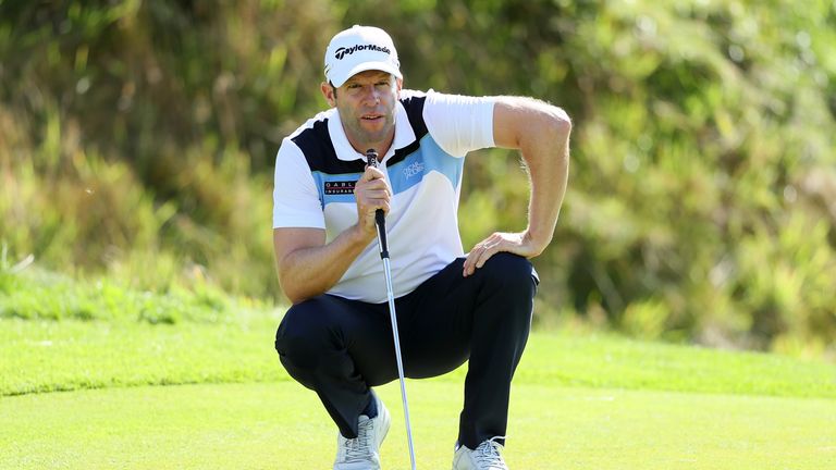 Bradley Dredge held onto the lead despite a one-over 72 in the third round