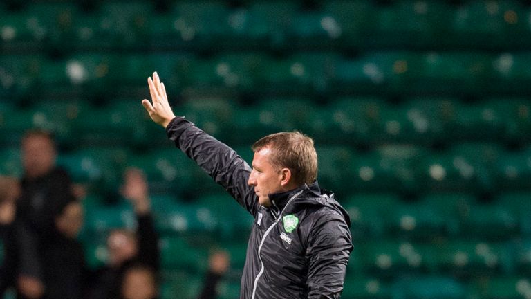 Brendan Rodgers waves to Celtic fans after the 5-0 win over Motherwell in the Betfred Cup