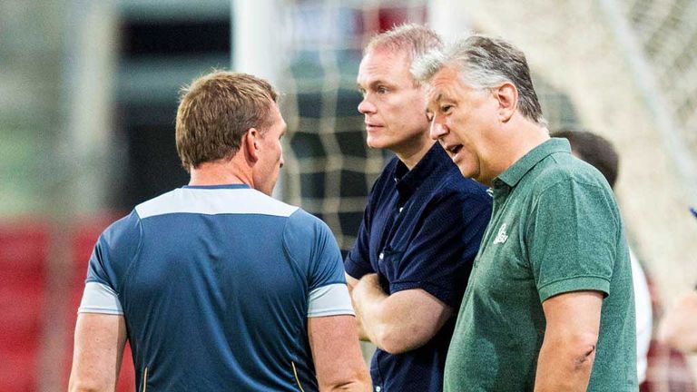 Brendan Rodgers (left) talks to Peter Lawwell before the play-off second leg in Israel