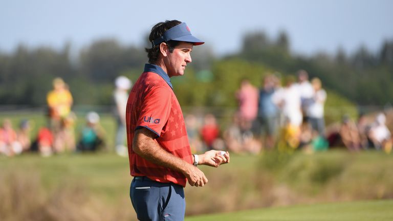 RIO DE JANEIRO, BRAZIL - AUGUST 14:  Bubba Watson of the United States throws a ball to fans on the 18th green after finishing the final round of men's gol