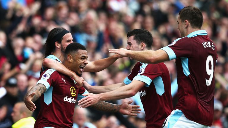 Andre Gray celebrates scoring Burnley's second goal against Liverpool