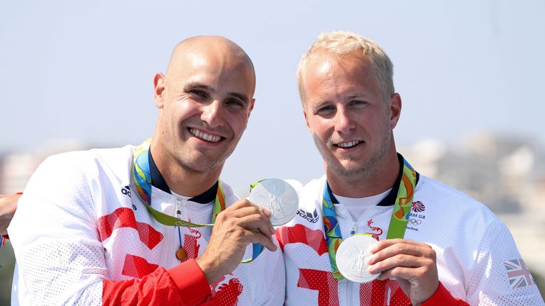 Great Britain's Liam Heath (left) and Jon Schofield with their silver medals for the Canoe Sprint Men's Kayak Double 200 metres at the Lagoa Stadium on the