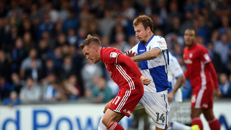 Cardiff City's Craig Noone (left) and Bristol Rovers' Chris Lines battle for the ball during the EFL Cup, First Round match at the Memorial Stadium, Br