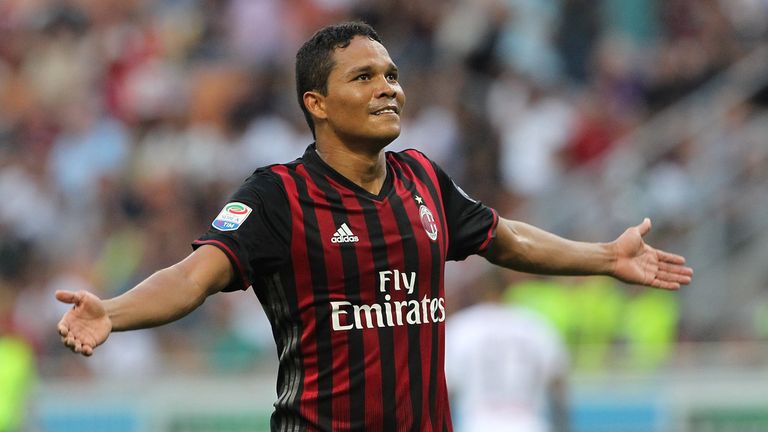 MILAN, ITALY - AUGUST 21:  Carlos Bacca of AC Milan celebrates his third goal during the Serie A match between AC Milan and FC Torino at Stadio Giuseppe Me