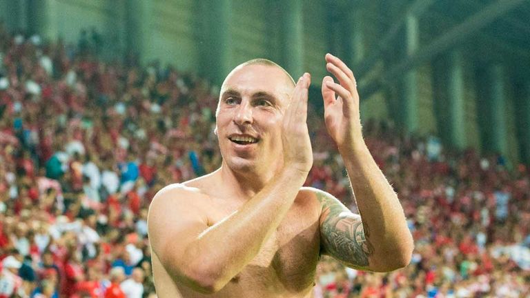 Celtic captain Scott Brown saluts the fans at full-time in Israel