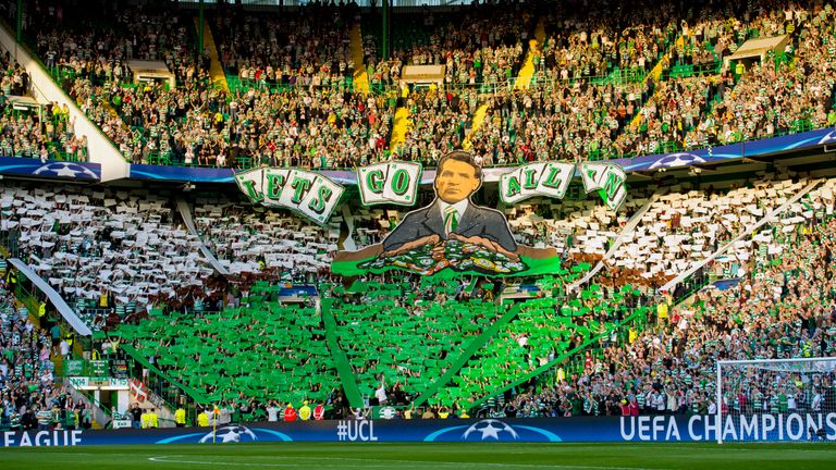 Celtic fans show a display reading 'Let's go all in' before the start of the game against Hapoel Be'er Sheva