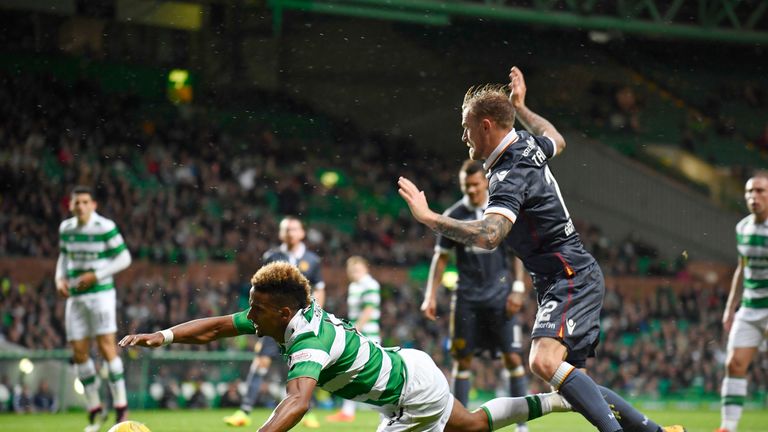 Richard Tait concedes a penalty as Scott Sinclair goes to ground on Wednesday