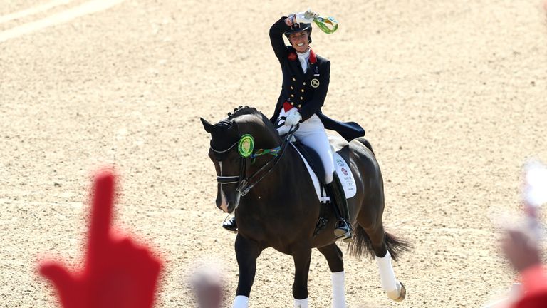 Charlotte Dujardin of Great Britain riding Valegro celebrates her gold medal