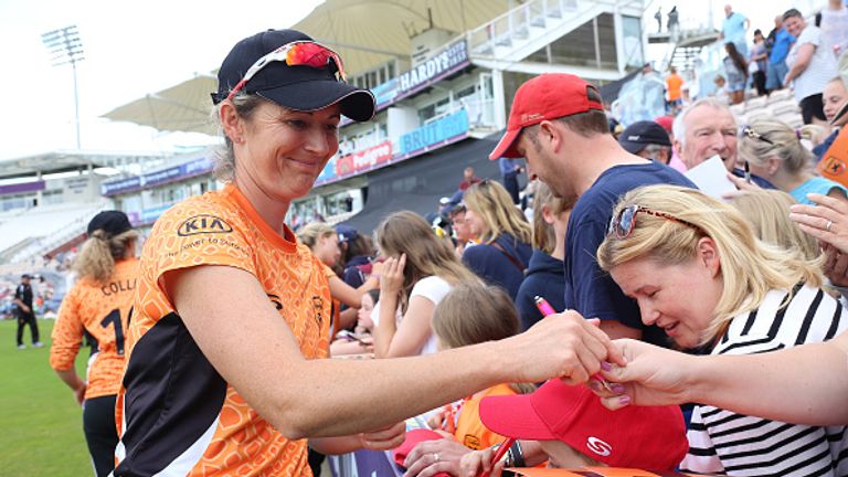 SOUTHAMPTON, ENGLAND - JULY 31: Charlotte Edwards of the Southern Vipers signs autographs after the Kia Super League women's cricket match between the Sout