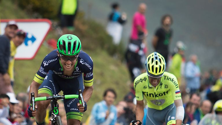 Orica-Bikeexchange Colombian cyclist Esteban Chaves (L) and Tinkoff's Spanish cyclist Alberto Contador arrive at the finish line during the 10th stage of t