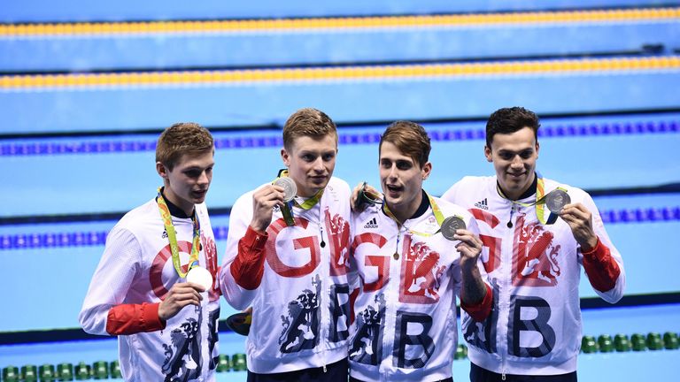 (L-R) Britain's silver medallists Duncan Scott, Adam Peaty,  Chris Walker-Hebborn and James Guy